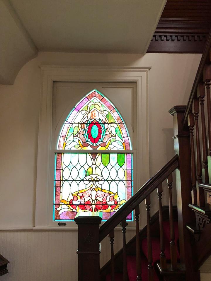 All Souls Church stained glass and stairway